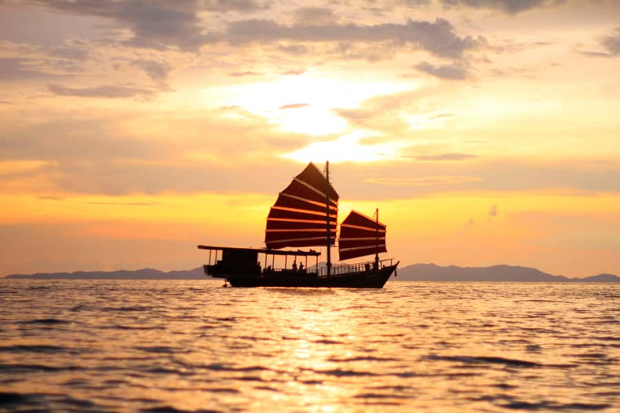 Krabi: 4-Island Sunset Snorkeling Tour & Bioluminescent Swim - Why the old junk boat changes the day