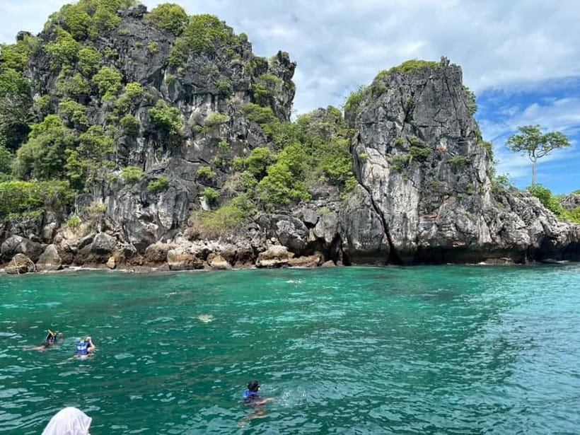 Krabi: 7 Islands Sunset by Longtail Boat with Snorkeling - Yawasam Island: the first snorkeling stop