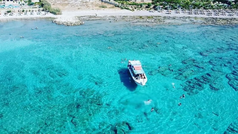 Lindos: Glass Bottom Boat Tour with Snorkeling - St. Paul’s Bay from the water