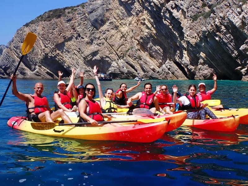 Lisbon: Kayaking & Snorkeling Tour with photos included - Paddling beneath Arrabida’s dramatic cliffs