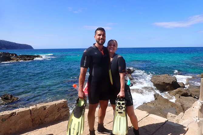Mallorca: Snorkeling in a Beautiful Nature Reserve - Getting fitted with fins, mask, snorkel, and wetsuit