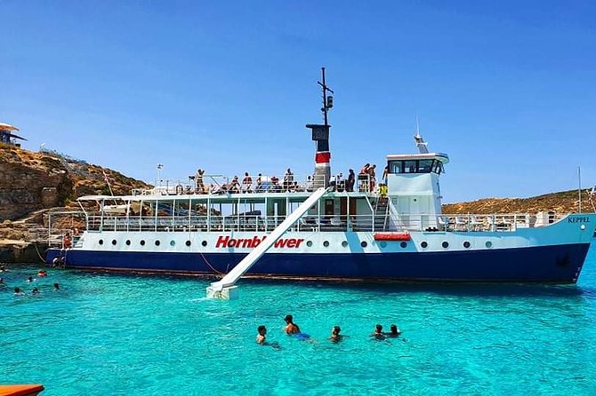 Malta: Comino, Blue Lagoon & Caves - swim, snorkel & slide - Swimming, snorkeling and the boat slide