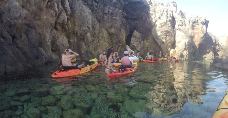 Menorca: Kayak and Marine Reserve Snorkeling Adventure - Paddling past La Mola de Fornells