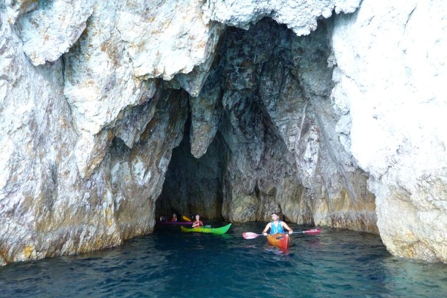 Milos: Guided Kayaking Trip with Snorkelling & Lunch - The first hour: cliffs, caves, and calm instruction