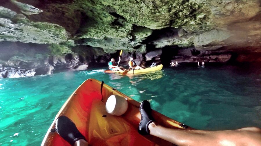 Mogán: Guided Kayak to Caves and Snorkeling Tour - Entering Gran Canaria’s volcanic sea caves