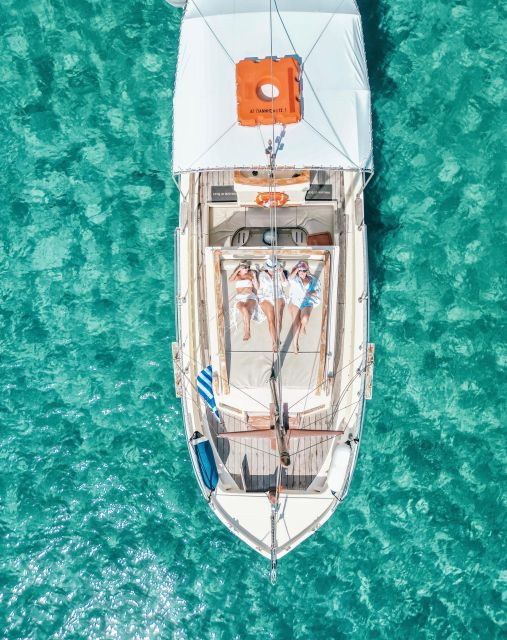 Mykonos: Private Cruise by Wooden Boat with Snorkeling - What the wooden boat and private setting feel like
