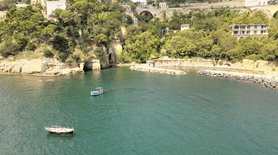 Naples: Castel dell'Ovo Boat Tour with Snorkeling & Aperitif - Palazzo Donn’Anna and Naples’ grand waterfront homes