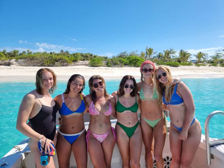 Nassau: Rose Island Swimming Pigs & Turtles Snorkeling Tour - Leaving Paradise Island on a 35-foot Donzi