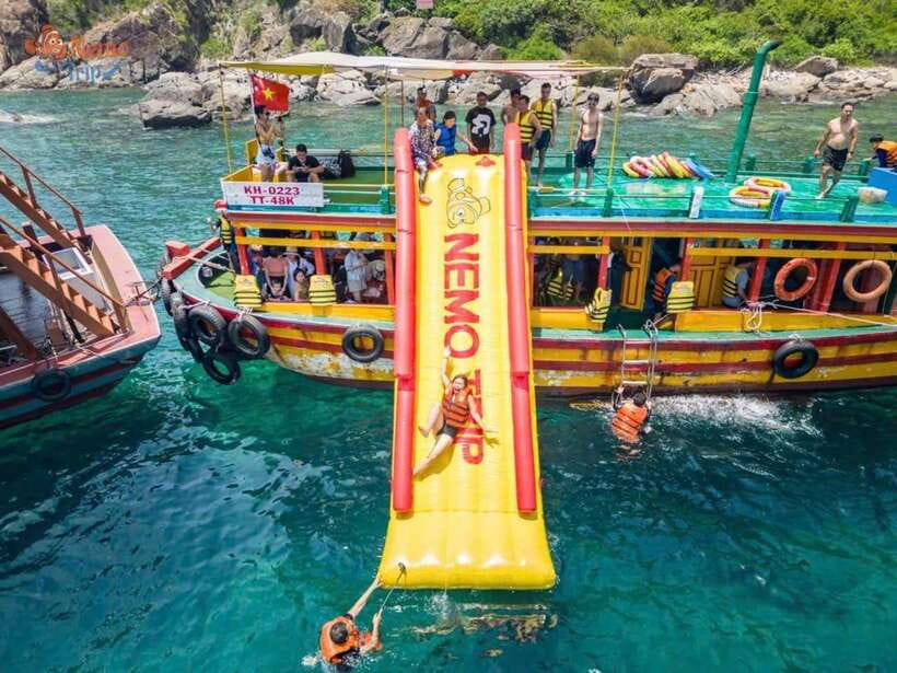 Nha Trang: Hopping Tour, Snorkeling, Boat Party, & BBQ Lunch - The quick take: coral, cocktails, and a white-sand stop