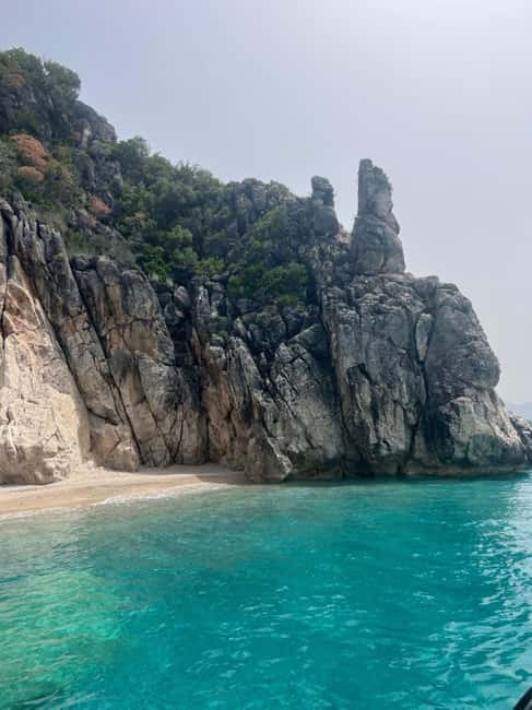 North Coast : Himare Boat Tour with Snorkeling Stops - Entering Pirates Cave near the end