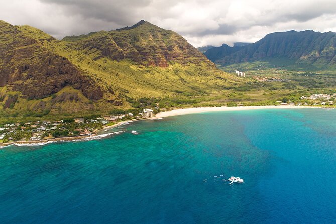 Oahu Dolphin and Snorkel Tour with Waikiki Pickup & Lunch - The slide, kayaks, and paddle boards