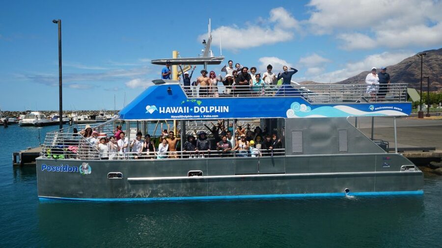 Oahu: Wild Dolphins Swim Turtle Snorkel Tour & Waterslide - The waterslide and floating gear keep the boat lively