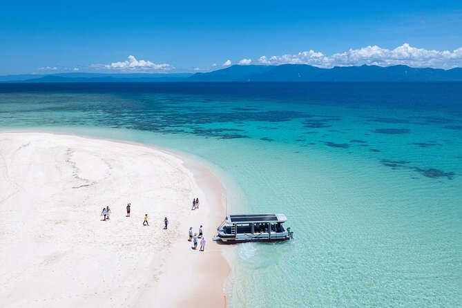 Outer Reef Mackay Cay Sail & Snorkel Adventure from Port Douglas - The glass-bottom boat and coral cay stop