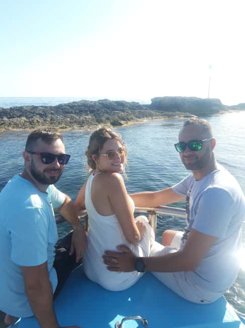 Paphos: The Yellow Glass-Bottom Boat Cruise Swim & Snorkel - Returning past cliffs, coves, and beaches