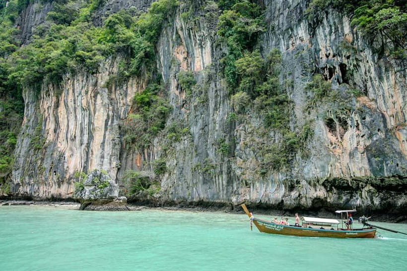 Phi Phi: 7 Island Longtail Boat Snorkeling Tour with Sunset - Lunch, fruit, water, and the practical comforts