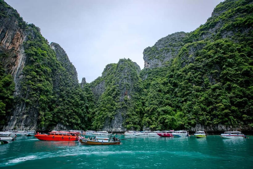 Phi Phi: 7 Island Longtail Boat Snorkeling Tour with Sunset - Loh Samah Bay and the value of several snorkel stops