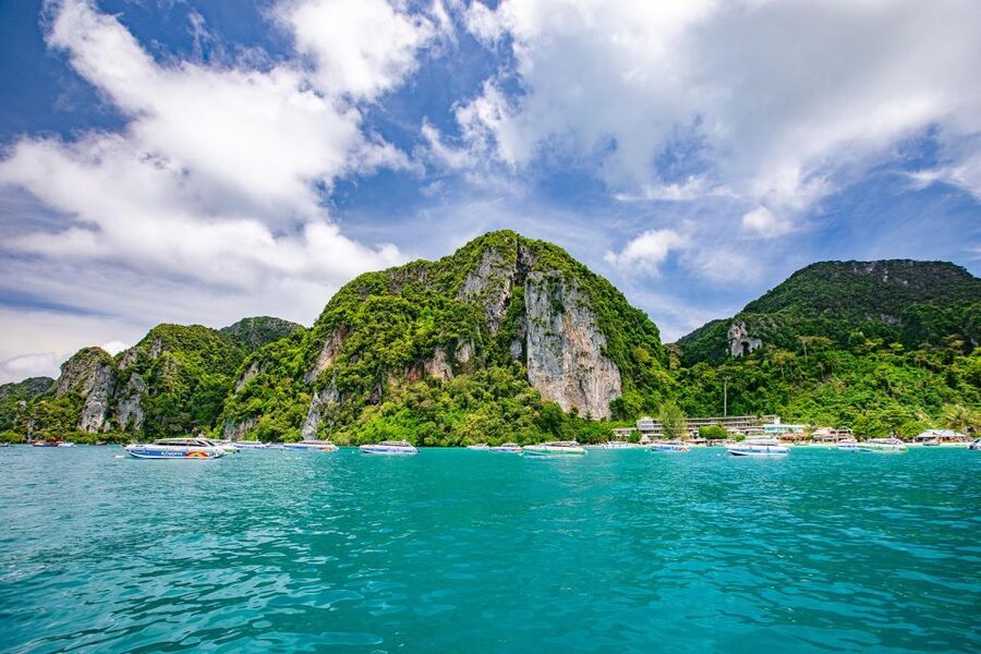 Phi Phi: Half-Day Phi Phi Snorkeling Trip by Longtail Boat - Pi Leh Lagoon, framed by limestone walls