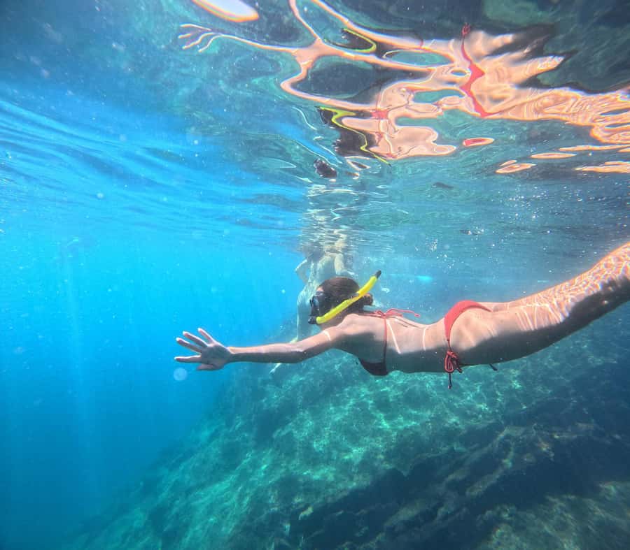 Phi Phi: Pirate Boat with Snorkeling, Kayaking, and Party - Monkey Beach: a lively first stop