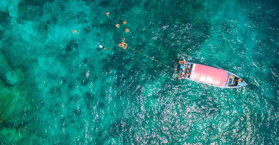 Phuket: Coral Island Longtail Boat Cruise with Snorkeling - Lunch at a local restaurant, with one extra cost