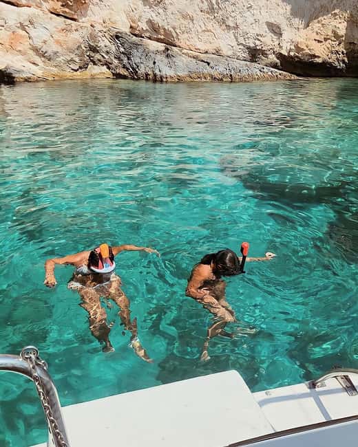 Pillirina, Ortigia, caves: Boat Tour, Snorkeling & Prosecco - Leaving the port and seeing Ortigia from the water