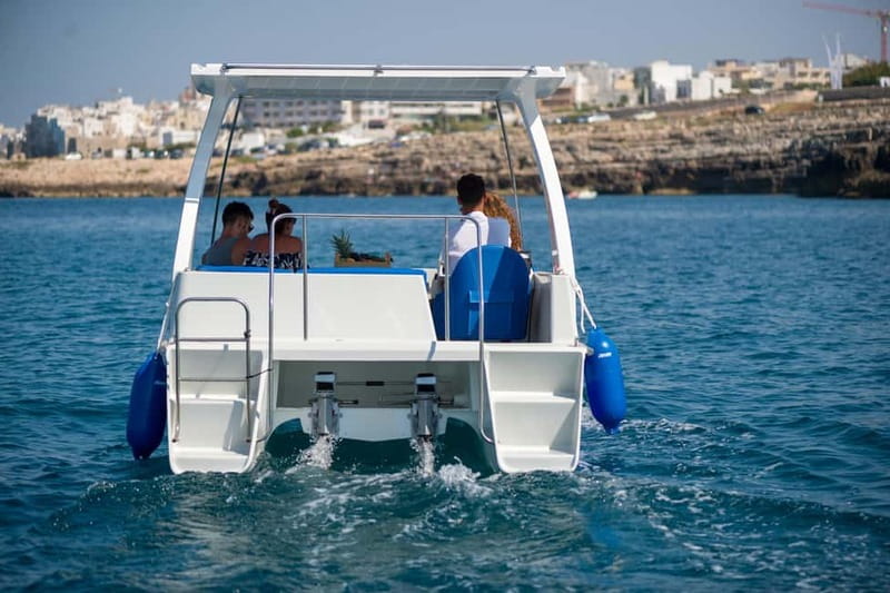 Polignano a Mare: Eco Boat Tour with Snorkeling and Caves - Domenico Modugno Monument and Lama Monachile