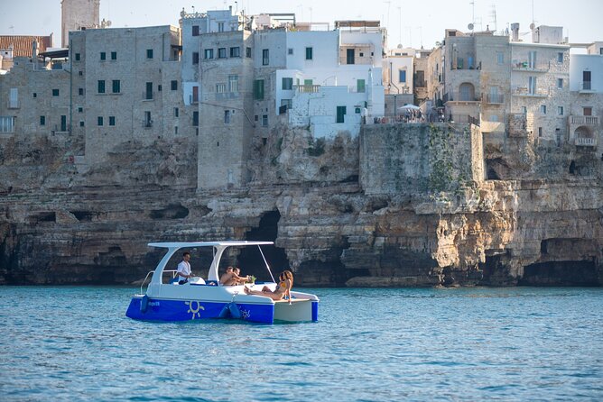 Polignano a Mare Eco Boat Tour with Snorkeling Mar y Sol - Domenico Modugno from the water