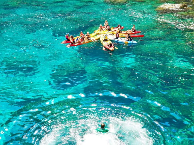 Pollença: Kayak Discovery – Snorkeling and Caves - Paddling beneath 300-meter cliffs