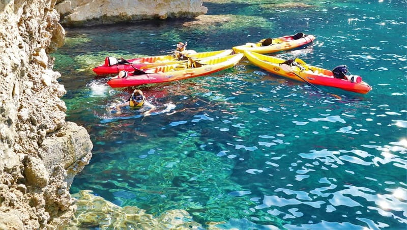 Pollença: Kayak Discovery – Snorkeling and Caves - Snorkeling in clear water around the reefs