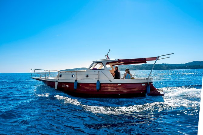 Private boat tour- explore the islands, find hidden caves and try snorkelling - Koločep’s blue cave and four-cave stop