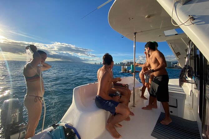 Private Catamaran Cruise and Snorkeling Tour in Honolulu - Drinks, music, and the relaxed boat setup
