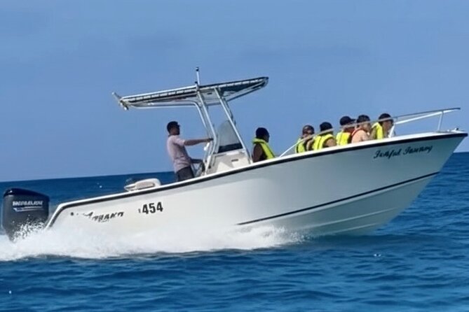 Private catamaran sail & snorkel - A relaxed coast cruise after the swim