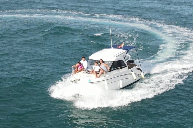 Private Snorkeling Boat Sailing Experience Included - Snorkeling, swimming, and the included drink