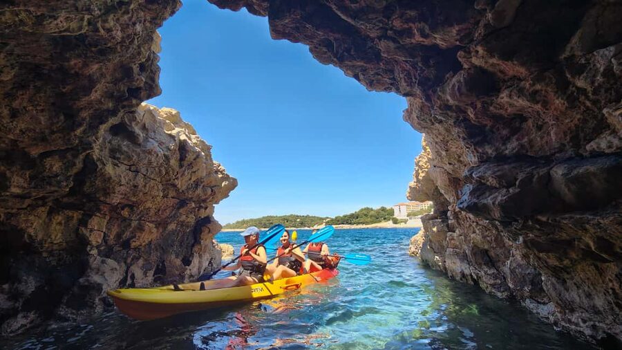 Pula: Cave Kayak Tour, Snorkeling and Island Jumping - Starting at Ambrela Beach with a quick lesson