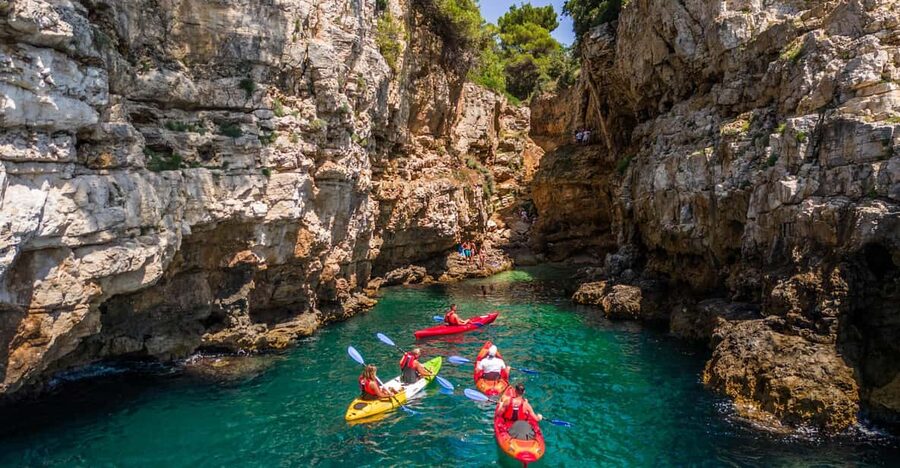 Pula: Kayak Adventure with Cave & Island Snorkeling - A gentle 20-minute paddle to Grotta di quarzo