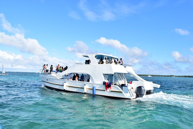 Punta Cana Booze Cruise, Snorkeling, Sand-Bar with Entertainment - Boarding the boat near Playa Bávaro