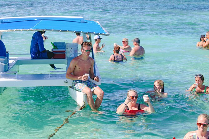 Punta Cana Exclusive Adults-Only Snorkel with Food and Drinks - Floating pools, reef structures, and the bar