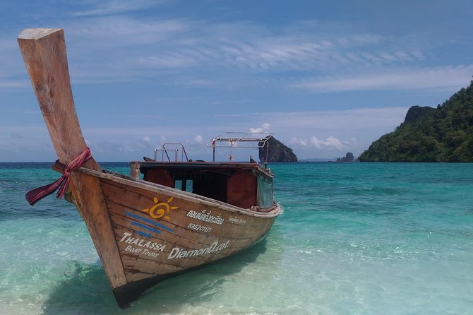 Railay and 4-Island Sunset Speedboat Cruise with Night Snorkel - The chicken-shaped limestone island