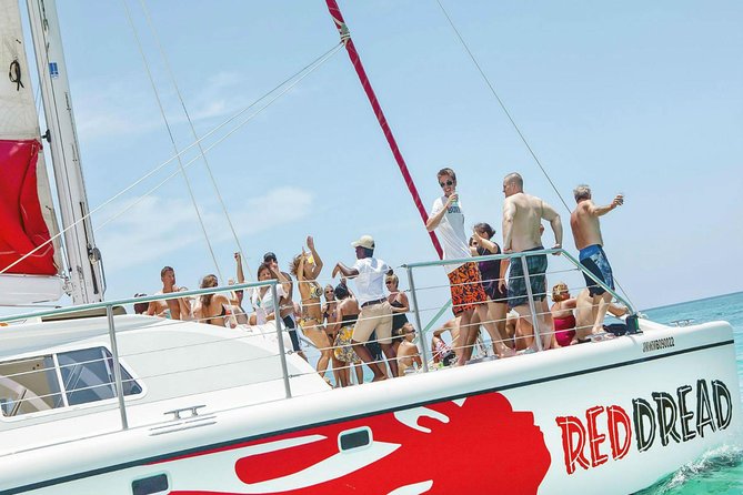 Reggae Catamaran and Snorkeling Open Bar Cruise Montego Bay - Tropical Bliss Beach and the first boarding step