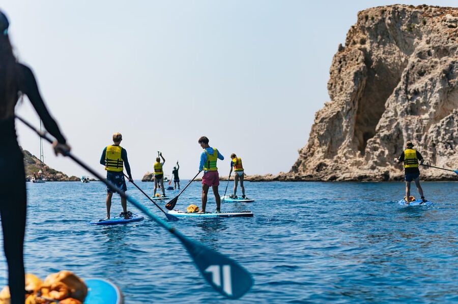 Rhodes: Stand-Up Paddleboard and Snorkeling Tour - Paddling below the cliff-lined coast