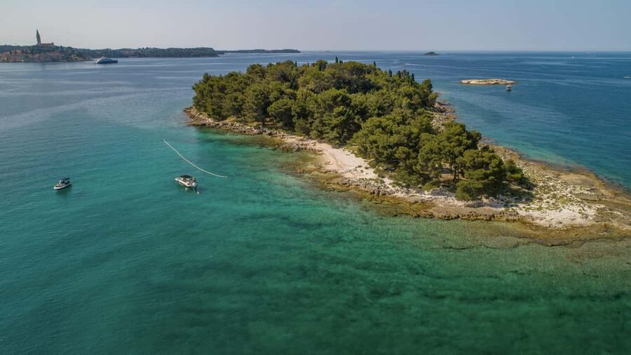 Rovinj: Luxury Island Hopping with Swimming & Snorkeling - Golden Cape and the first views from the water