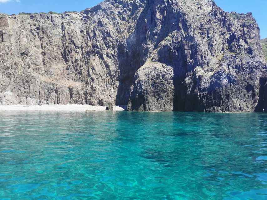 Sant'Antioco: Scenic Dinghy Tour with Snorkeling Gear - Following the coast toward the coves