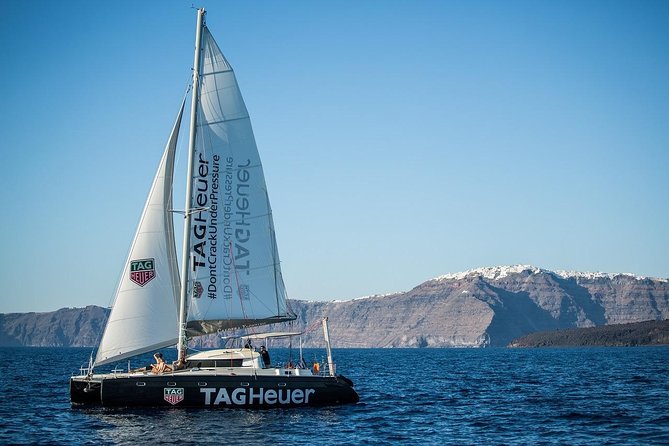 Santorini Adventurous Catamaran Experience with Snorkeling - Swimming at Nea Kameni’s warm springs