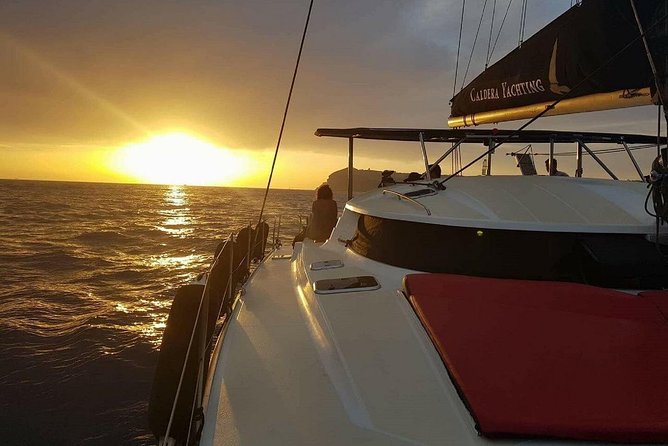 Santorini Adventurous Catamaran Experience with Snorkeling - Lunch, dinner, wine, and the practical value