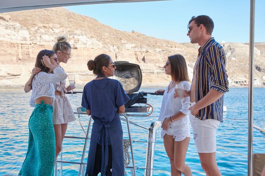 Santorini Gold Catamaran Cruise with Snorkel, BBQ & Open Bar - The caldera cliffs look different from sea level