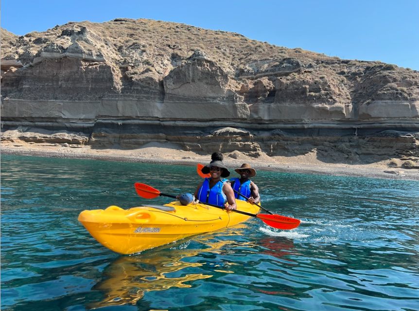 Santorini: Sea Caves Kayak Trip with Snorkeling and Picnic - Transport, equipment, and what you should pack