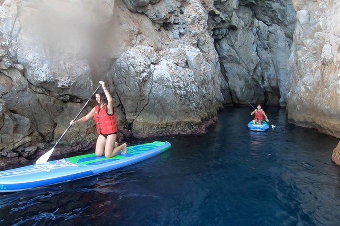 Santorini: Stand-Up Paddle and Snorkel Adventure - The cove and small cave