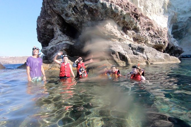 Santorini: Stand-Up Paddle and Snorkel Adventure - Snorkeling below the board