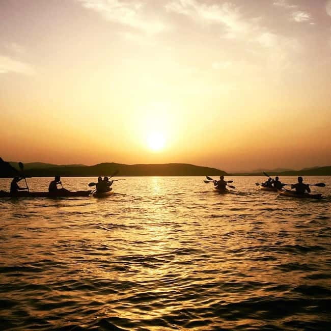 Sardinia: Sunset Kayak Tour + Snorkeling and Local Aperitif - A Sardinian aperitif floating on the sea