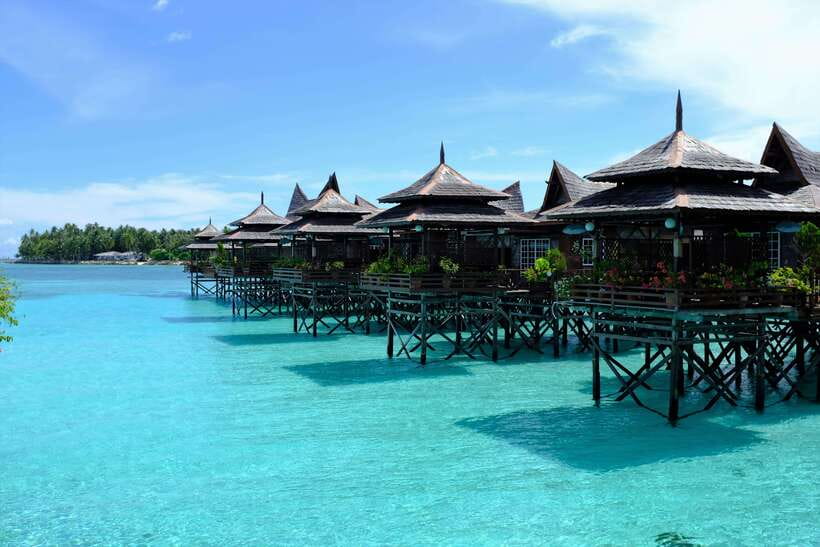 Semporna: Mabul and Kapalai Trip in Snorkel or Dive & Lunch - Mabul’s water bungalows and village views