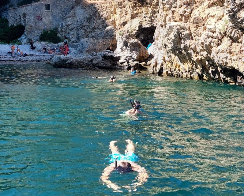 Sesimbra: Secret Bays and Beaches Boat Tour with Snorkeling - The crew shapes the experience